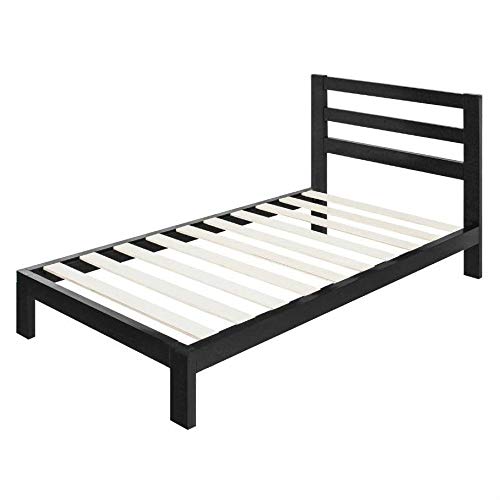 A black bed frame supporting a white mattress, showcasing a modern and minimalist design.