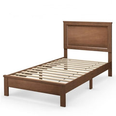 A bed constructed with wooden slats and a headboard, emphasizing a rustic aesthetic and sturdy craftsmanship.