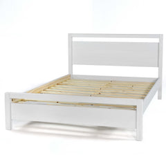 A white bed with a wooden headboard and slatted base, combining comfort with a stylish wooden finish.