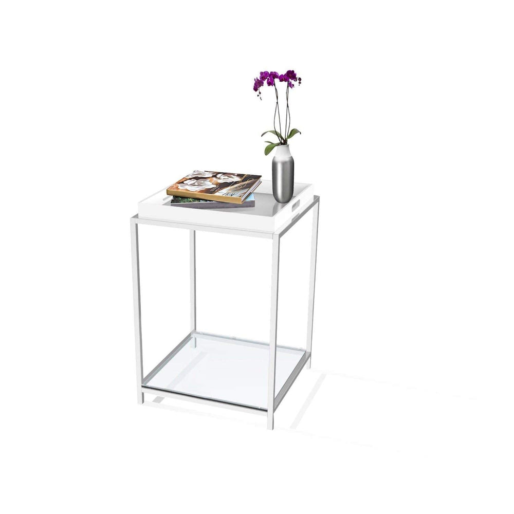 A white side table with a flower vase placed on top, adding a touch of decor to the setting.