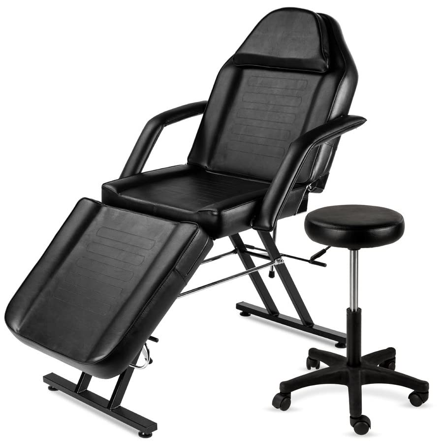 A sleek black massage chair with an integrated footrest and a coordinating stool, ideal for home or spa use.