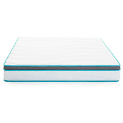 A foam mattress displayed on a bed frame, showcasing its soft and supportive design for comfortable sleep.