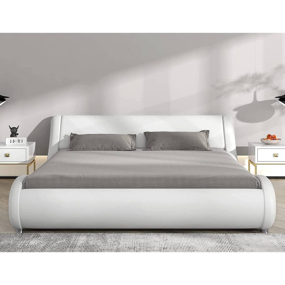 A modern white bed with a sleek grey headboard and footboard, creating a stylish focal point in the room.