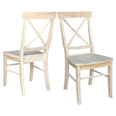 Two wooden chairs positioned against a plain white background.