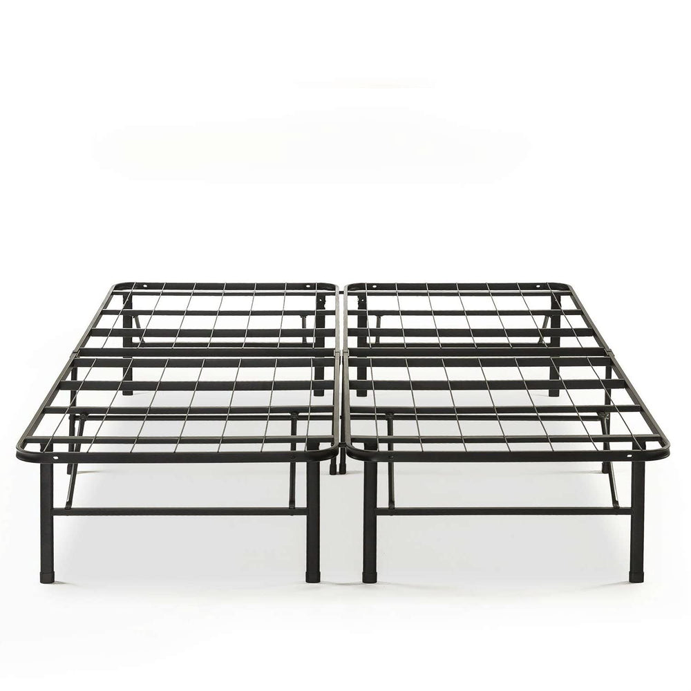 2. A metal bed frame with four legs, designed for durability and strength.