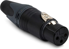 Close-up image of a black and silver plug, emphasizing its sleek design and electrical connectors.