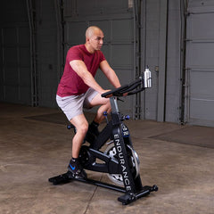 Endurance (ESB250) Indoor Cycling Bike - Heavy-Duty Frame, 44lb Flywheel, Road Style Pedals, Adjustable Seat and Handlebars, Transport Wheels