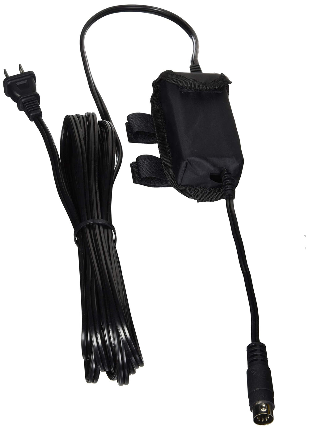 A black power cord with a plug attached, coiled neatly on a white surface.