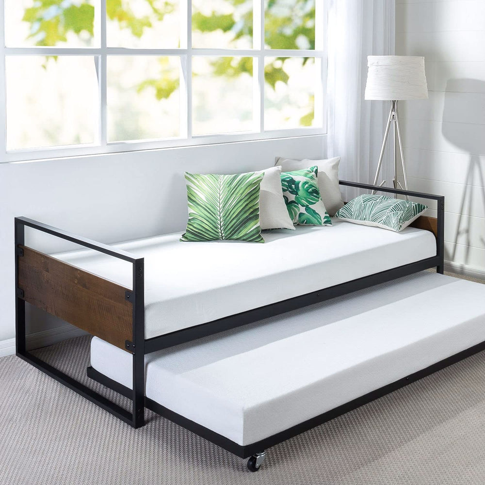 2. A stylish day bed with a plush mattress and an assortment of colorful pillows for added comfort.