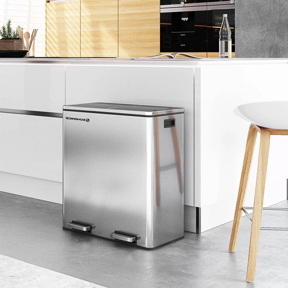 A sleek stainless steel trash can located in a tidy kitchen, complementing the contemporary decor.