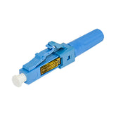 A blue fiber optic connector with a white plastic casing, utilized for connecting fiber optic cables in various applications.