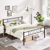 A black metal bed frame with a white bed, showcasing a clean and minimalist design in a cozy bedroom setting.