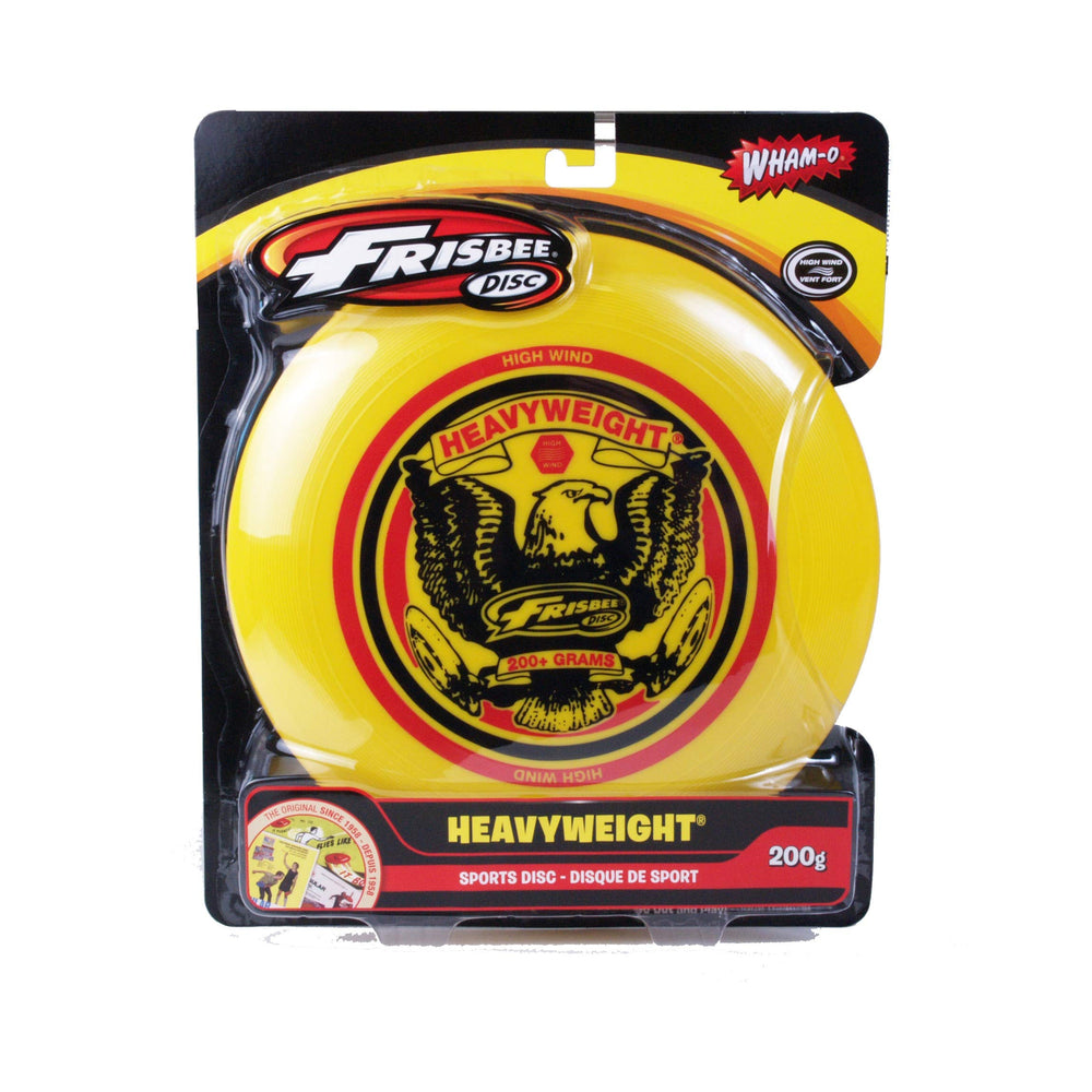 A collection of frisbees in different colors and patterns laid out on grass, emphasizing their fun and recreational use.