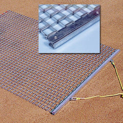 A detailed view of a metal mesh screen with a sturdy metal bar and a wire integrated into the design for support.