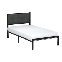 A bed featuring a sleek black frame and a crisp white mattress, positioned against a neutral background.
