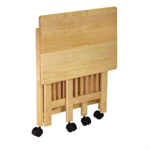 A portable folding table on wheels, showcasing a sturdy wooden top, perfect for events or small spaces.