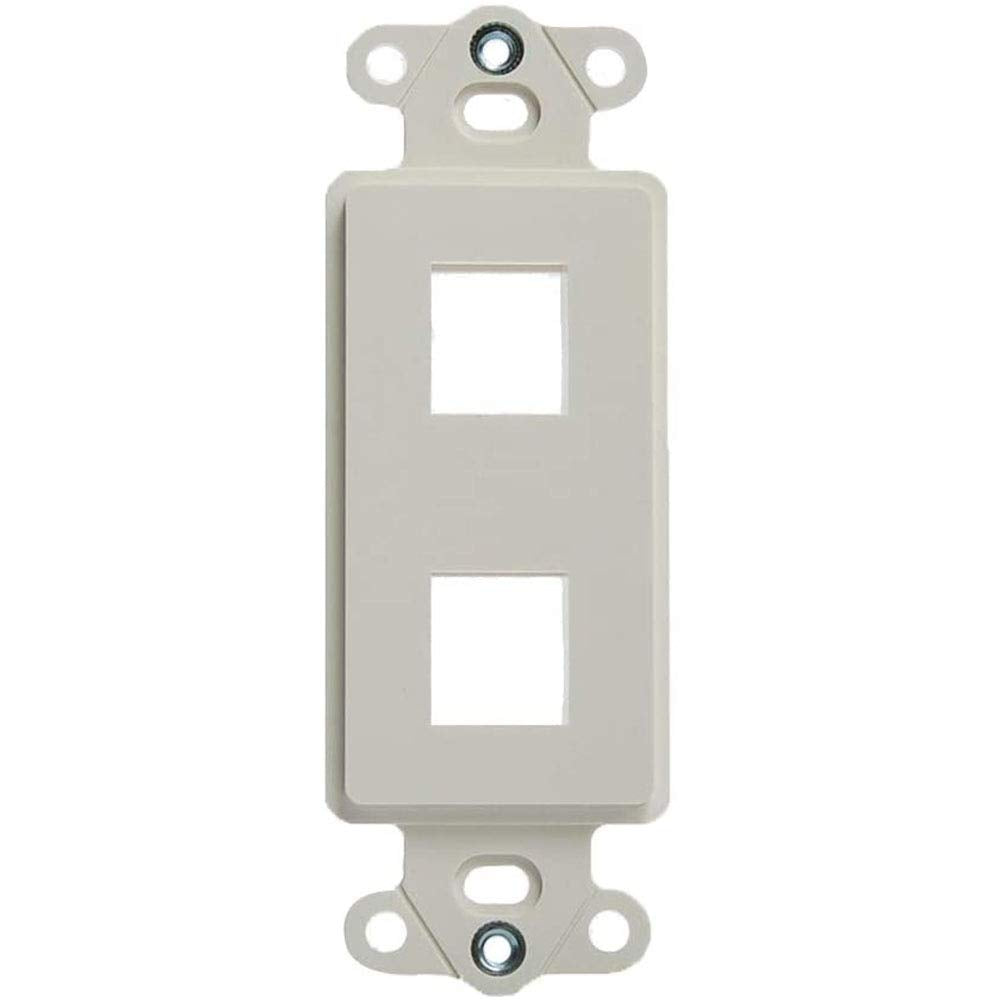A white wall plate showing four circular openings, typically used for electrical connections.