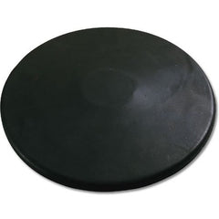 A circular black plastic cover placed on a white background, highlighting its glossy finish and simple design.