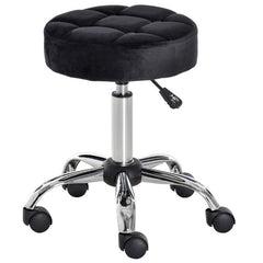 A black rolling stool displayed on a white surface.