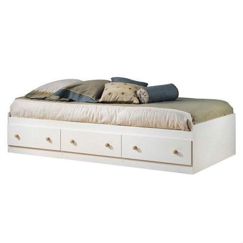 A white bed with storage drawers underneath and a plush mattress, ideal for maximizing space in a bedroom.