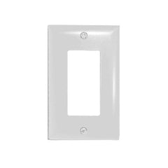 A single light switch on a white wall plate, positioned on a smooth, light-colored wall.