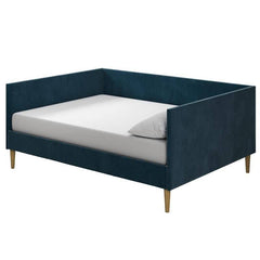 Blue velvet daybed with a wooden structure and a gold frame, elegantly designed for comfort and style.