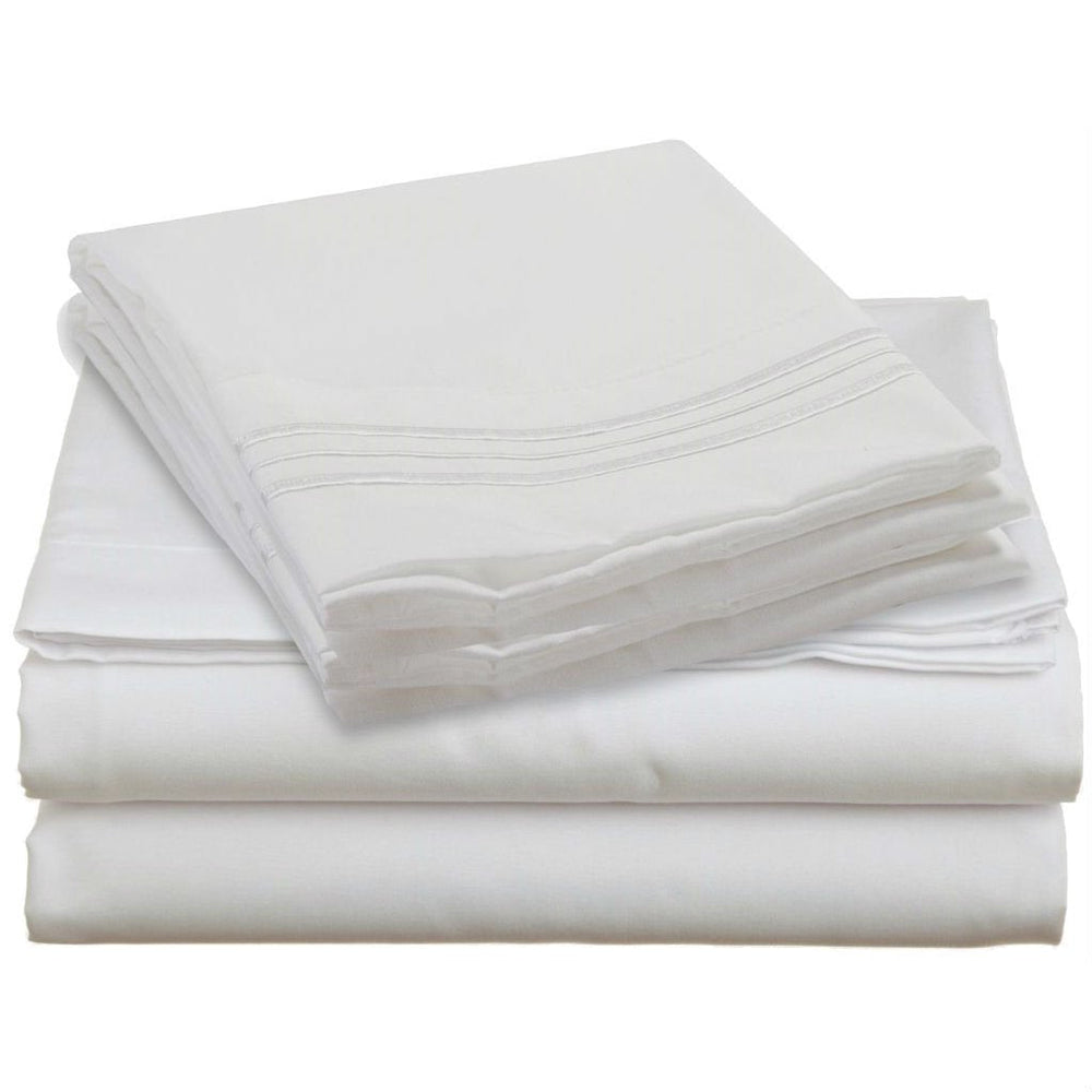 A neatly stacked pile of white sheets resting on a white surface, emphasizing simplicity and uniformity.