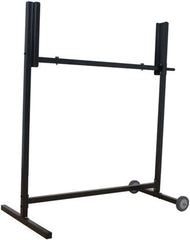 A black metal stand with wheels, designed for mobility and stability in various settings.