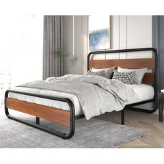 A modern bed with a sleek metal frame and an elegant wooden headboard.