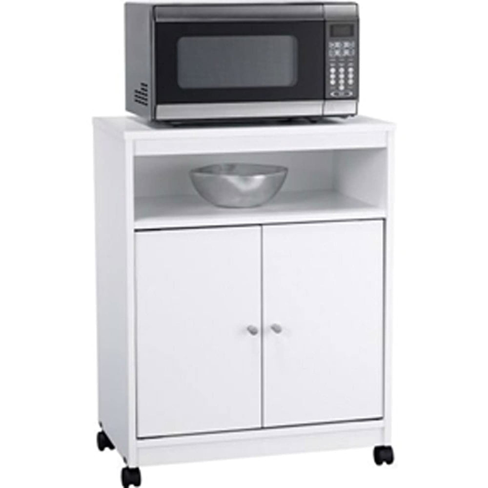 A white cabinet holds a microwave, with a bowl placed on top, showcasing a simple kitchen arrangement.