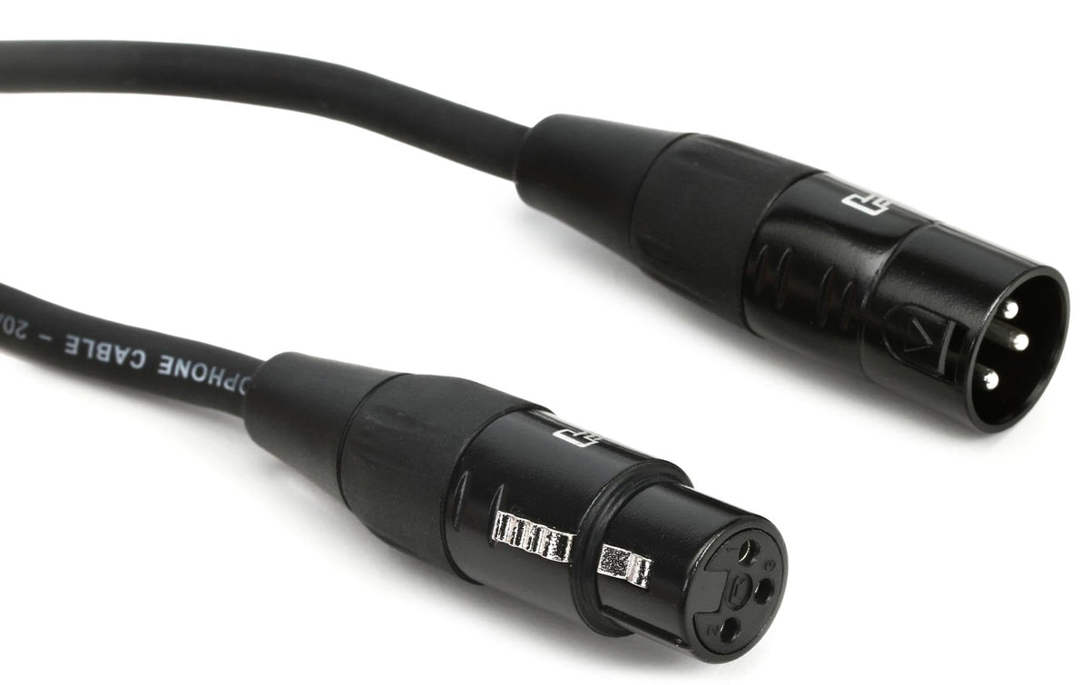 Close-up image of a black cable and plug, emphasizing their sleek, uniform appearance.