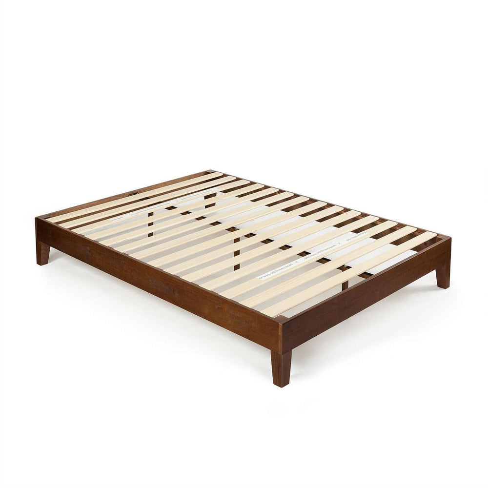 A bed frame constructed with wooden slats, designed to provide sturdy support for a mattress.