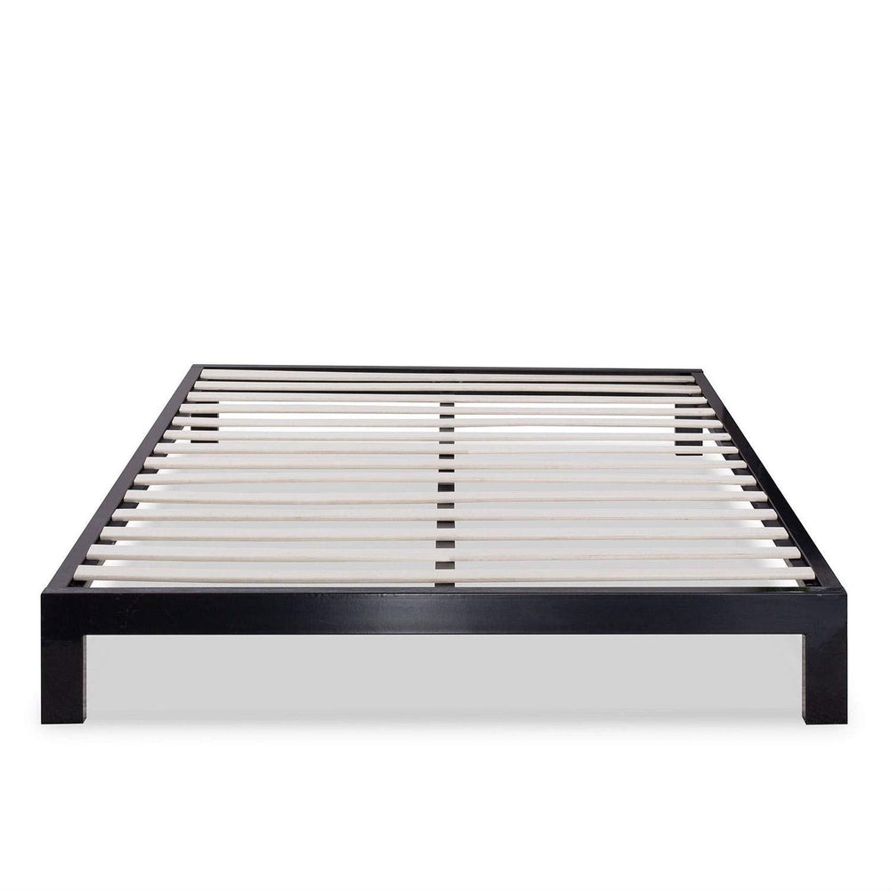 A stylish black metal bed frame adorned with white slats, highlighting a clean and modern look.