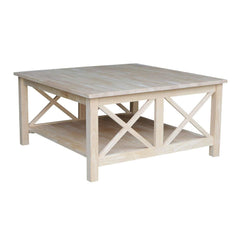 A stylish white coffee table featuring sturdy wooden legs, perfect for contemporary home decor.