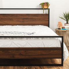 A stylish bed with a metal frame and a warm wood headboard design.