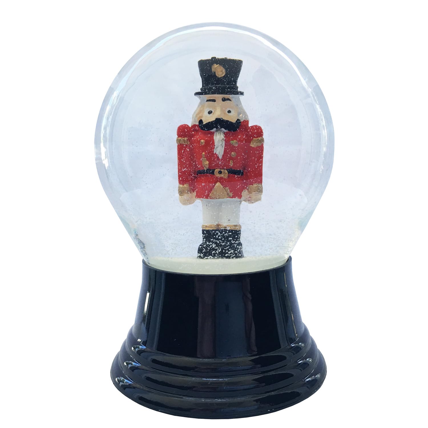 A decorative snow globe containing a nutcracker, set against a snowy backdrop.
