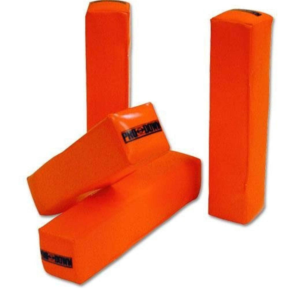 Three orange foam football blocks displaying the word football prominently on each block.
