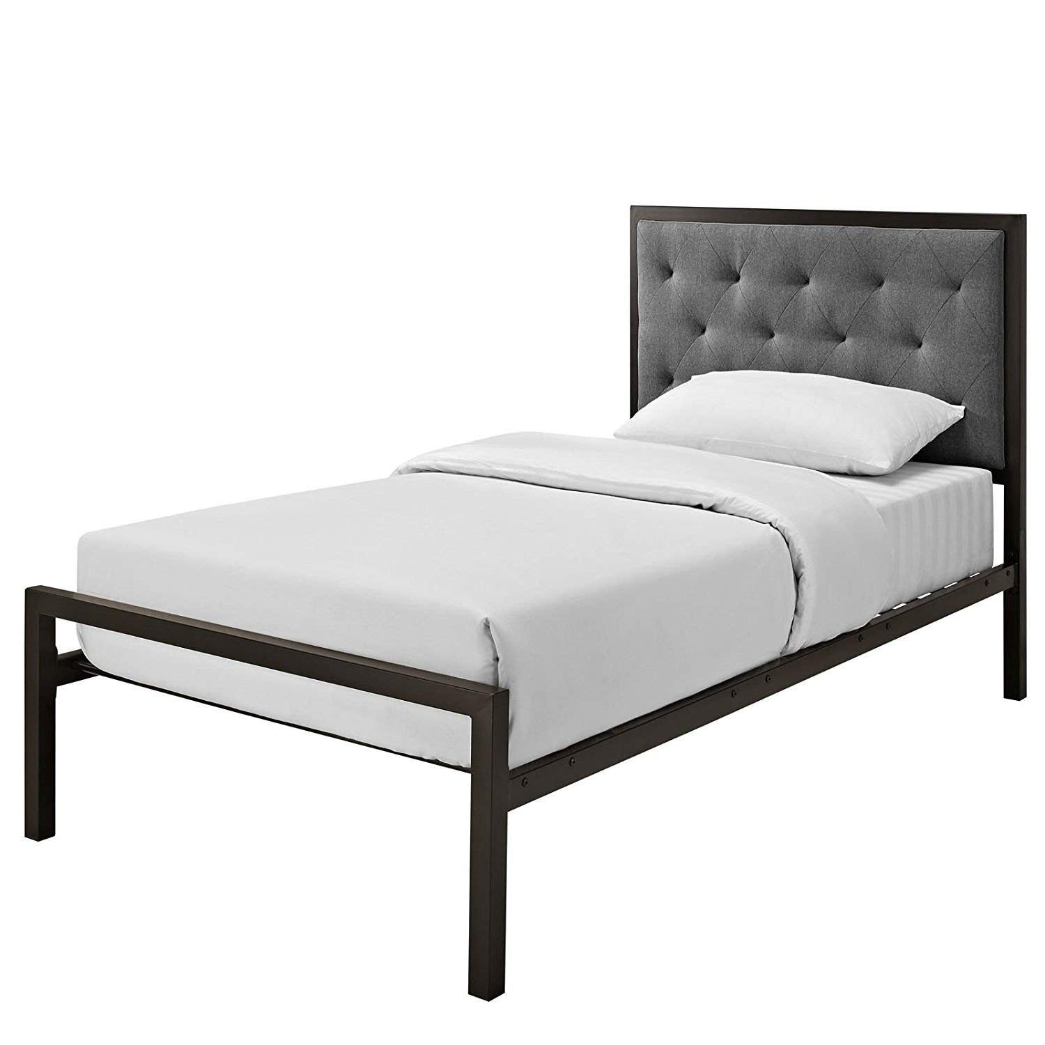 A modern bed showcasing a gray headboard paired with a black frame, ideal for a chic bedroom setting.