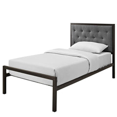 A modern bed showcasing a gray headboard paired with a black frame, ideal for a chic bedroom setting.
