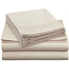 Four sheets stacked together, featuring a white sheet on top, displayed on a plain background.