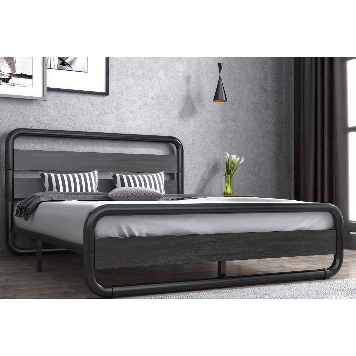 Contemporary bed frame with a sturdy metal design and a chic black headboard.