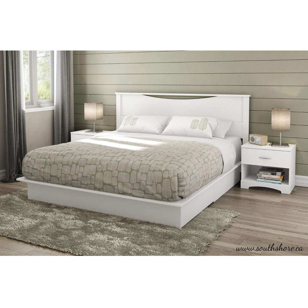 A minimalist white bed with a white headboard and footboard, emphasizing a clean and serene bedroom aesthetic.