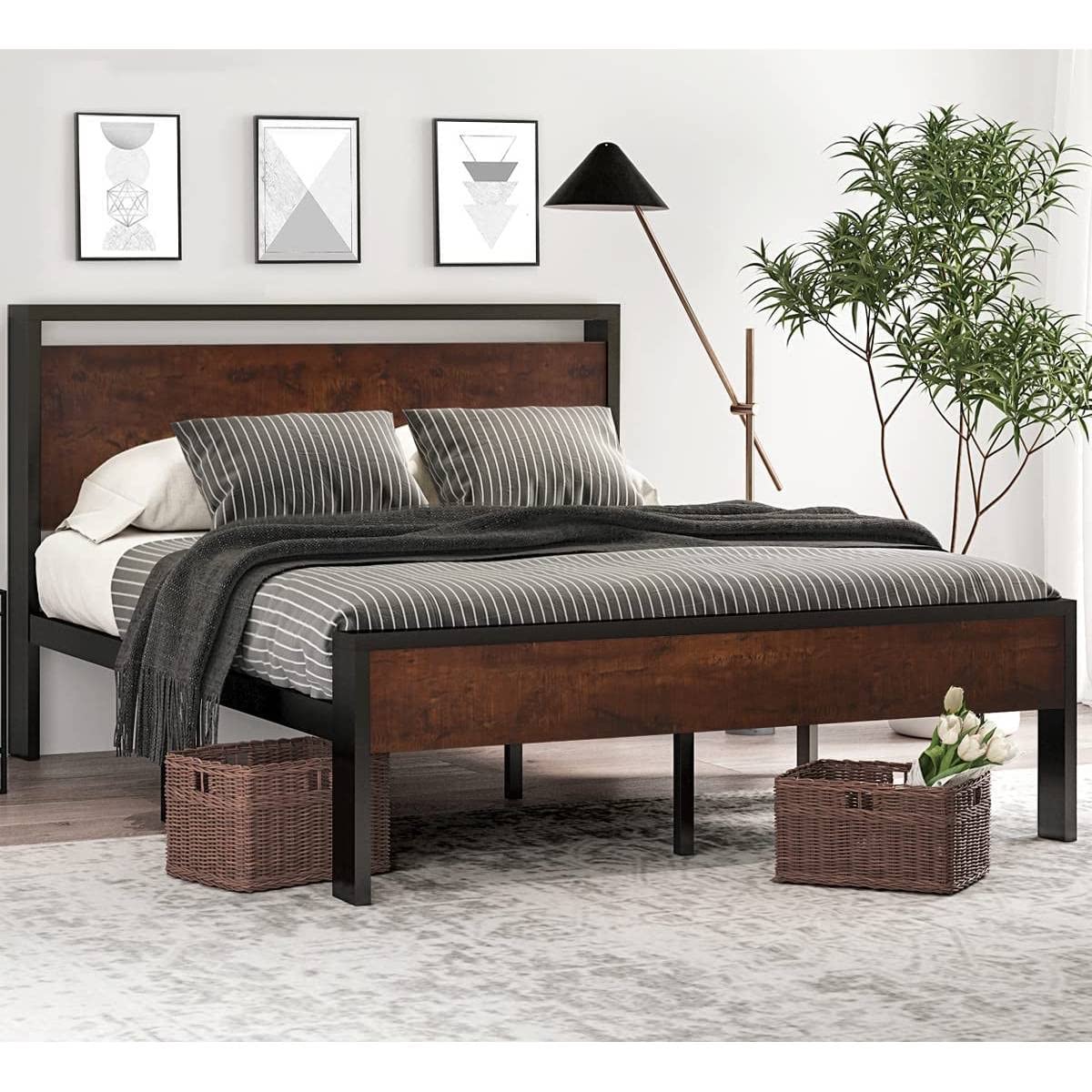 A stylish bed with a wooden frame and a contemporary black headboard, perfect for enhancing bedroom decor.