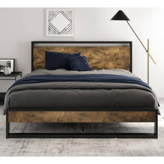 A modern bed featuring a wooden frame supported by sleek metal legs.