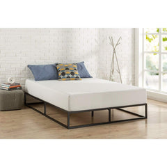 The image features a sturdy metal frame with a mattress placed on top, ideal for a contemporary sleeping arrangement.