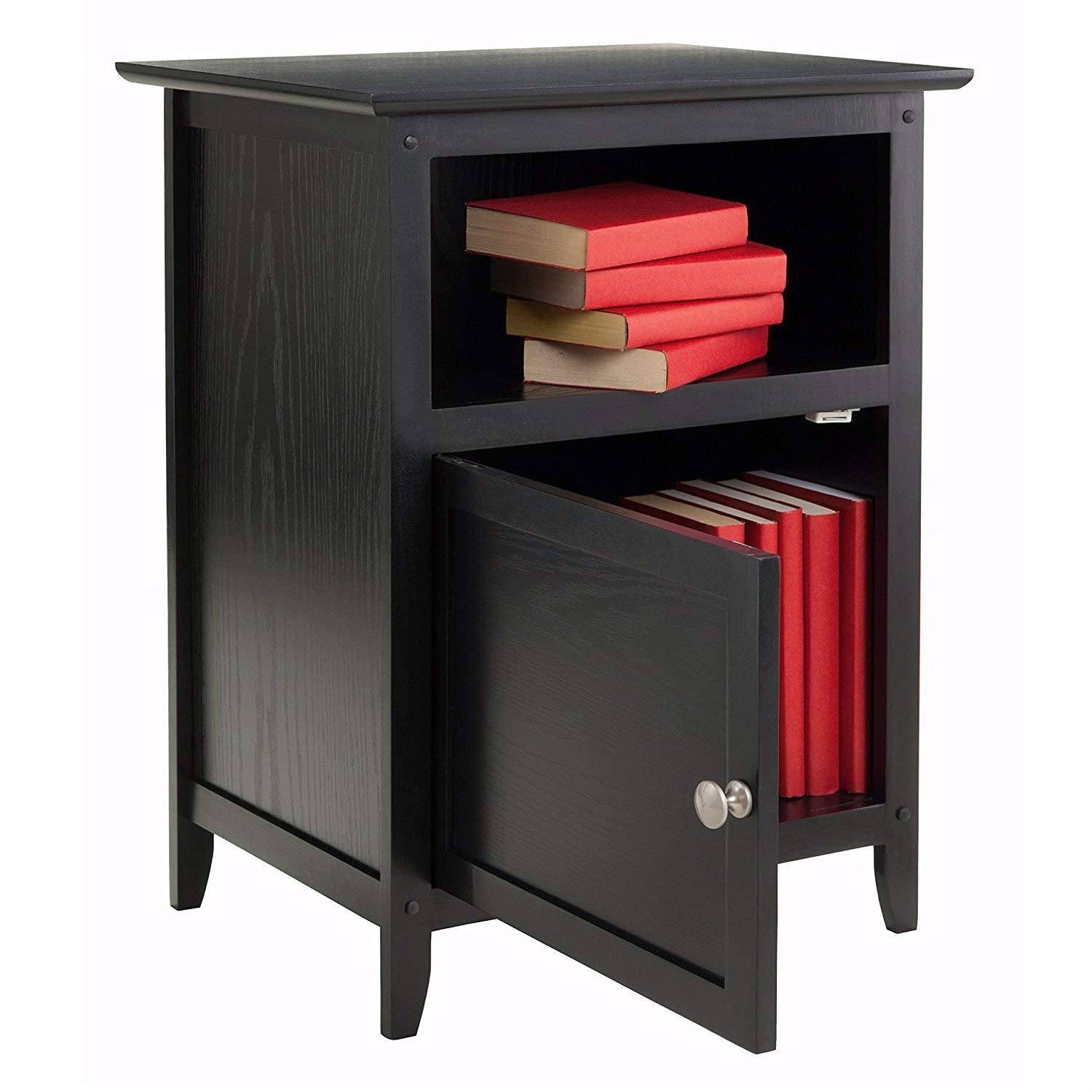 A black nightstand with a book shelf and a book, accompanied by a brown storage rack.