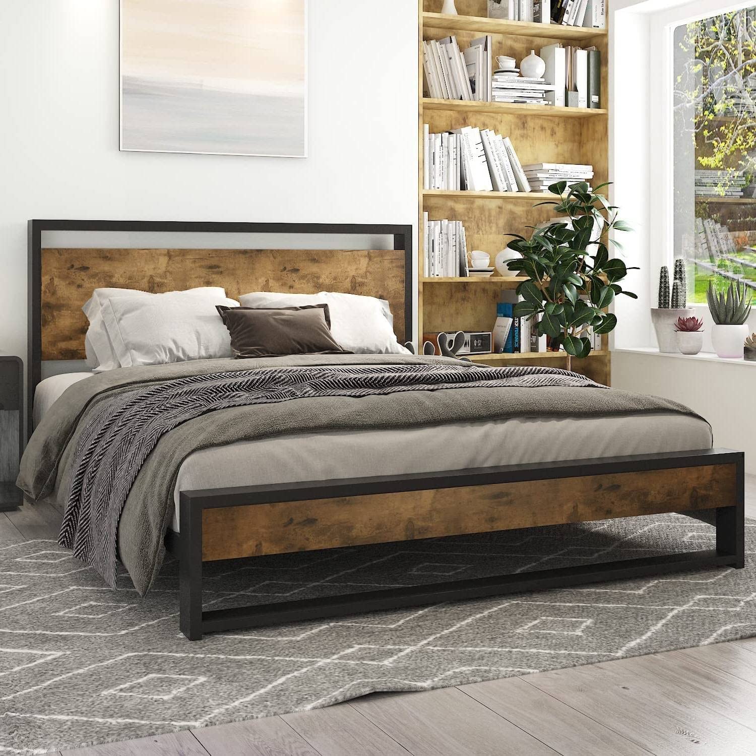 A bed featuring a solid wooden frame and headboard, showcasing a classic and inviting design.