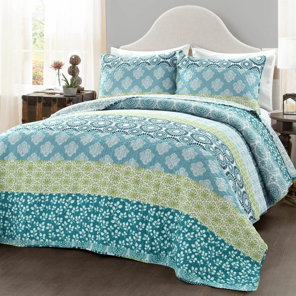 Aqua and green comforter set featuring a vibrant floral pattern, perfect for adding a fresh touch to any bedroom decor.