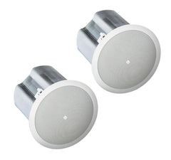A pair of white speakers set on a white backdrop.