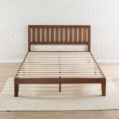 A wooden bed frame featuring slats and a matching headboard, showcasing a natural finish and sturdy design.
